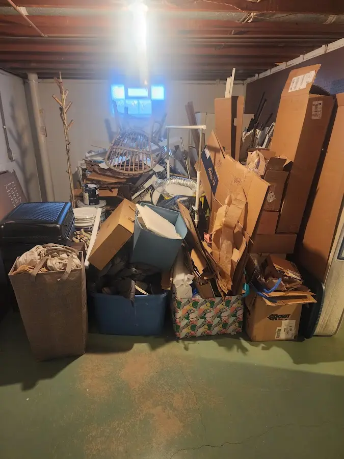 Roll-off dumpster container at job site for 4 Yard Dumpster Rental in Hurricane